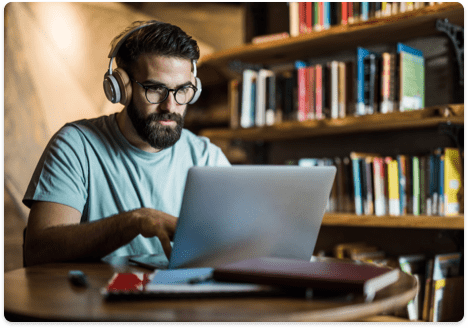 A male learning from his computer 